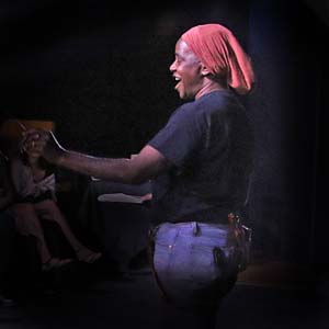 Camilla Ross singing to an audience